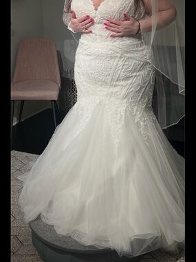 Stella York Ivory Lace Mermaid Wedding Gown